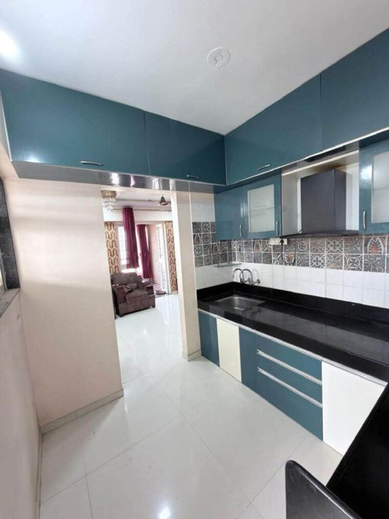 Kitchen, satyam-rajyog 2 Bedroom 1000 Sq.Ft. Apartment In Dhanori Pune 10570898