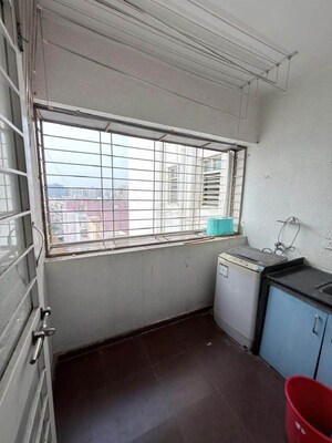 Kitchen in 2 BHK Apartment at Satyam Rajyog, Dhanori – for Rent