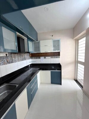 Kitchen in 2 BHK Apartment at Satyam Rajyog, Dhanori – for Rent
