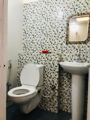 Bathroom in 3 BHK Apartment at Green Valley Heights, Dhakoli – for Rent