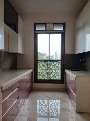 Kitchen in 2 BHK Apartment at Mukta Apartment 10th Main, Khar West – for Rent