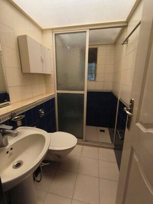 Bathroom in 2 BHK Apartment at Mukta Apartment 10th Main, Khar West – for Rent