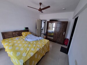 Bedroom in 2 BHK Apartment at Konark Elegance, Wadgaon Sheri – for Rent
