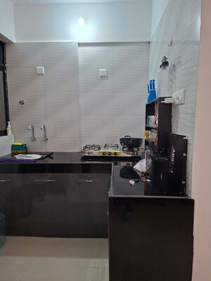Kitchen in 2 BHK Apartment at Konark Elegance, Wadgaon Sheri – for Rent