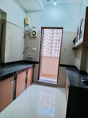 Kitchen in 2 BHK Apartment at K Raheja Heights, Malad East – for Rent