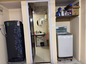 Team Area in 1 BHK Apartment at Royal Palms Garden View, Goregaon East – for Rent