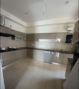 Kitchen in 3 BHK Apartment at Maya Green Lotus Utsav, International Airport Road – for Sale