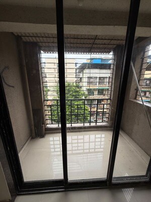 Balcony in 1 BHK Apartment at Ganesh Dham Kamothe, Kamothe Sector 21 – for Rent