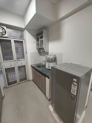 Kitchen in 2 BHK Apartment at Signature Global Orchard Avenue, Sector 93 – for Sale