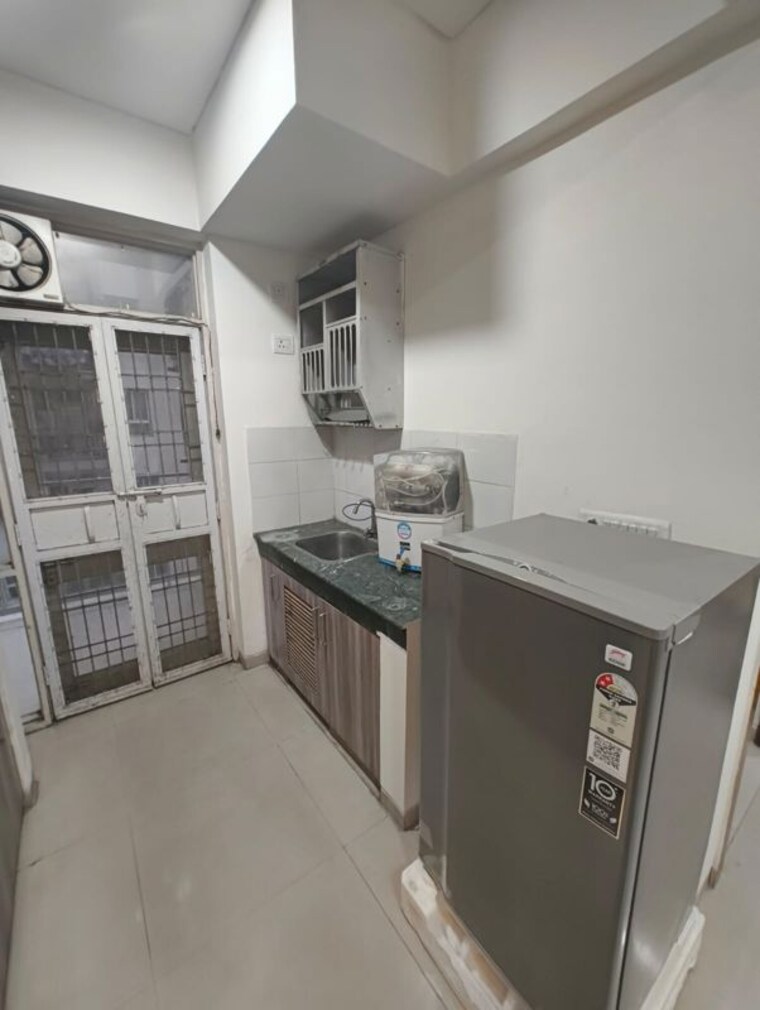 Kitchen, signature-global-orchard-avenue 2 Bedroom 645 Sq.Ft. Apartment In Sector 93 Gurgaon 10571127