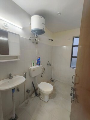 Bathroom in 2 BHK Apartment at Signature Global Orchard Avenue, Sector 93 – for Sale