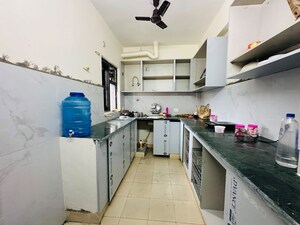 Kitchen in 2 BHK Apartment at Ansal Crown Heights, Sector 80 – for Rent