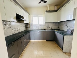 Kitchen in 3 BHK Apartment at Ansal Crown Heights, Sector 80 – for Rent