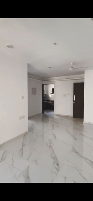 Room in 2 BHK Apartment at Dev Leo Tower, Oshiwara – for Rent