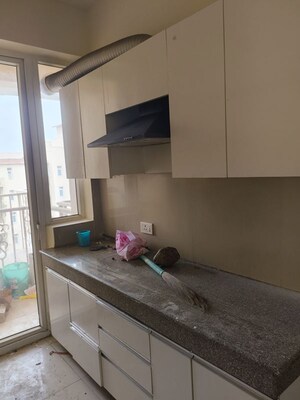 Kitchen in 3.5 BHK Apartment at Emaar Palm Hills, Sector 77 – for Rent