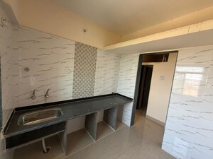 Kitchen in 1 BHK Apartment at Tharwani Ariana Phase IV, Ambernath West – for Sale