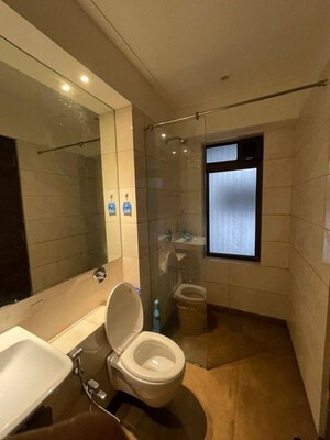 Bathroom in 2 BHK Apartment at Beach Apartment, Versova – for Rent