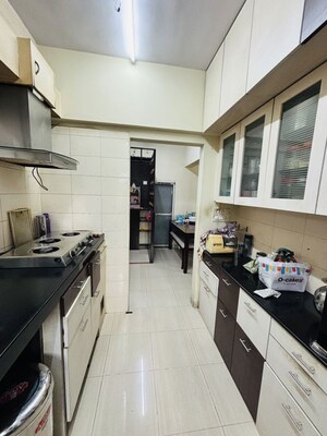 Kitchen in 2 BHK Apartment at Marathon Cosmos, Mulund West – for Rent