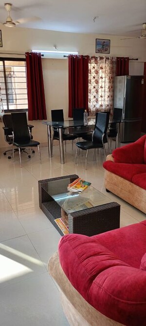 Living Room in 2 BHK Apartment at Magarpatta Sylvania, Hadapsar – for Rent