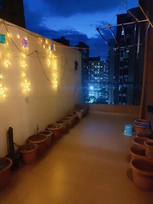 Living Room in 2 BHK Apartment at Magarpatta Sylvania, Hadapsar – for Rent
