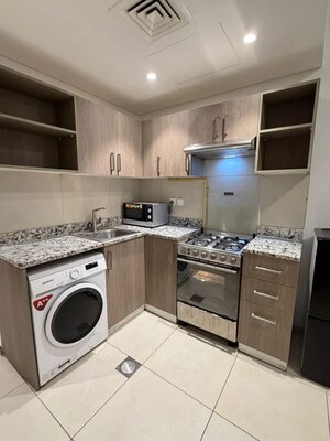 Kitchen in  Apartment at Dosti Maple, Balkum Pada – for Sale