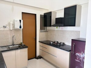 Kitchen in 2 BHK Apartment at Gera Planet Of Joy, Kharadi – for Rent