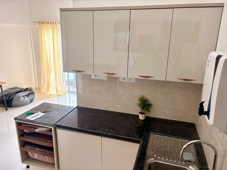 Kitchen, gera-planet-of-joy 2 Bedroom 850 Sq.Ft. Apartment In Kharadi Pune 10571622