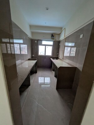 Kitchen in 3 BHK Apartment at Amisha Borivali Padam CHS, Borivali West – for Sale
