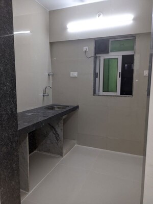 Kitchen in 2 BHK Apartment at Mauli Pride, Malad East – for Rent