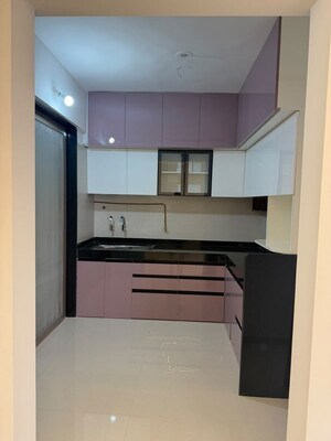 Kitchen in 2 BHK Apartment at Windows CHS, Sus – for Rent