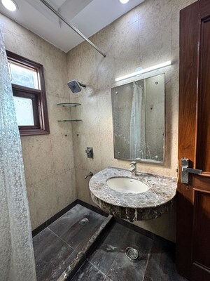 Bathroom in 3 BHK Builder Floor at Greater Kailash I – for Rent