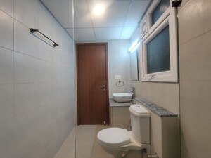 Bathroom in 2 BHK Apartment at Bhartiya Nikoo Homes Phase 2, Thanisandra Main Road – for Rent