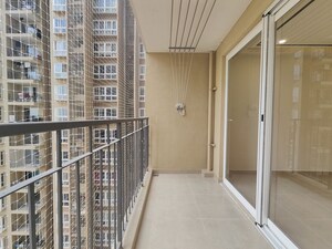 Balcony in 3 BHK Apartment at Bhartiya Nikoo Homes Phase 2, Thanisandra Main Road – for Rent