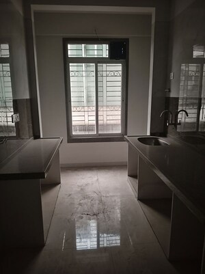 Kitchen in 2 BHK Apartment at Tanna Mangeshi Dazzle III, Thakurli – for Sale