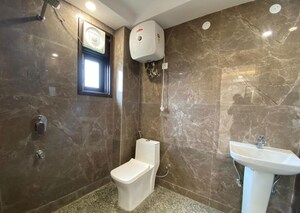 Bathroom in 2 BHK Builder Floor at Mehrauli – for Sale