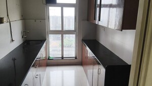 Kitchen in 2 BHK Apartment at Godrej Emerald, Ghodbunder Road – for Rent