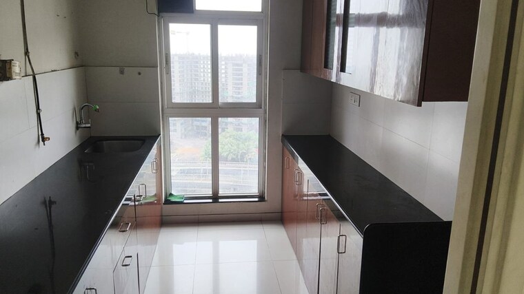 Kitchen, godrej-emerald 2 Bedroom 1000 Sq.Ft. Apartment In Ghodbunder Road Thane 10571939