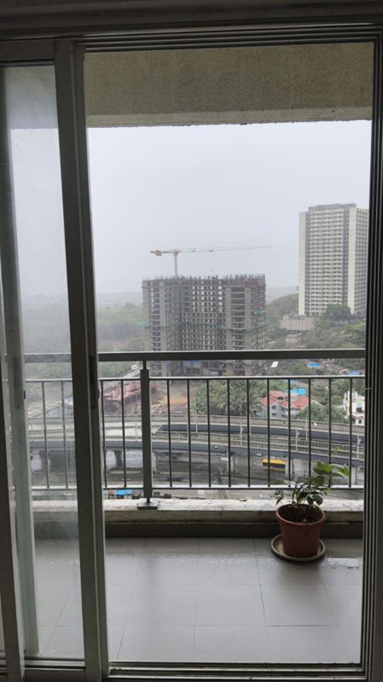Balcony, godrej-emerald 2 Bedroom 1000 Sq.Ft. Apartment In Ghodbunder Road Thane 10571939