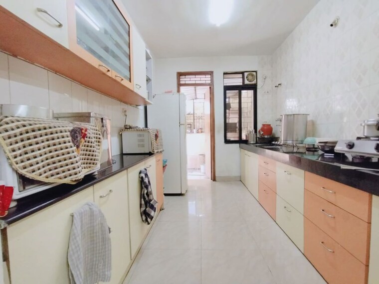 Kitchen, oxford-village-condominium 3 Bedroom 2900 Sq.Ft. Villa In Wanowrie Pune 10571983