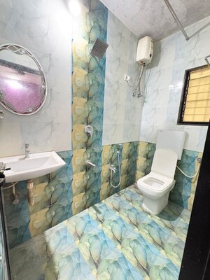Bathroom in 2 BHK Apartment at Shubharambh Complex, Manpada – for Rent
