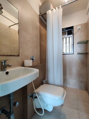 Bathroom in 2 BHK Apartment at Blackstone Maqba Heights, Bandra West – for Rent