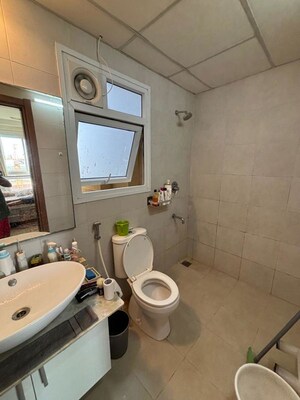 Bathroom in 3 BHK Apartment at Bhartiya Nikoo Homes, Thanisandra Main Road – for Rent