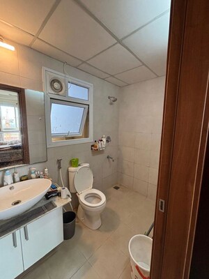 Bathroom in 3 BHK Apartment at Bhartiya Nikoo Homes, Thanisandra Main Road – for Rent