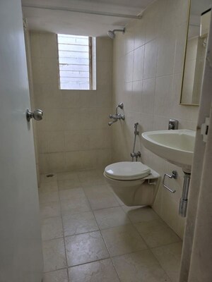 Bathroom in 2 BHK Apartment at Cozihom Apartments, Bandra West – for Rent