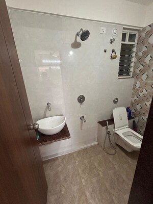 Bathroom in 2 BHK Apartment at Creative Venkatesh Pride, Kiwale – for Rent