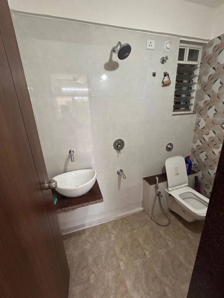 Bathroom, creative-venkatesh-pride 2 Bedroom 900 Sq.Ft. Apartment In Kiwale Pune 10572129