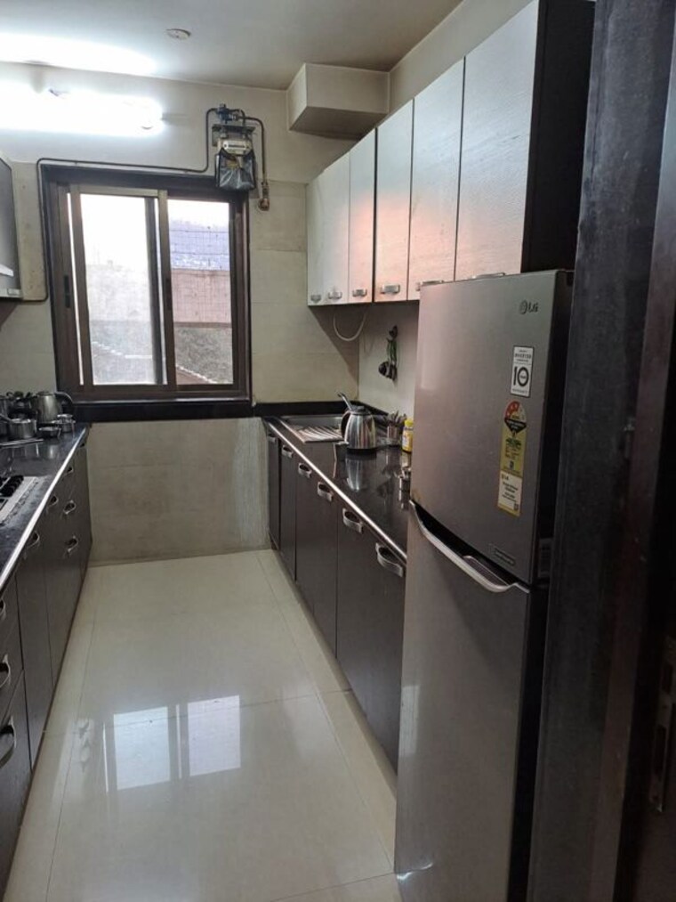 Kitchen, kalpataru-aura 3 Bedroom 850 Sq.Ft. Apartment In Ghatkopar West Mumbai 10572109