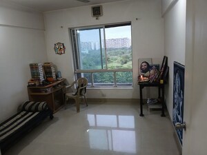 Living Room in 2 BHK Apartment at Konark Exotica, Wagholi – for Sale
