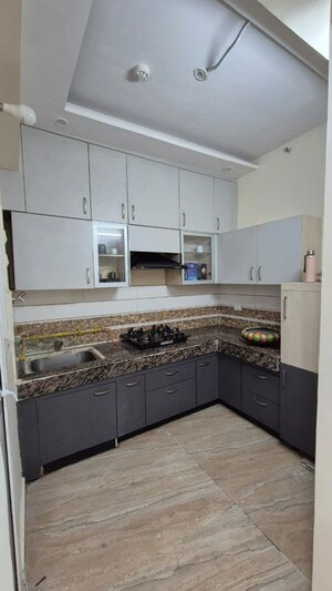 Kitchen in 2 BHK Apartment at Supertech Supernova Astralis, Sector 94 – for Rent