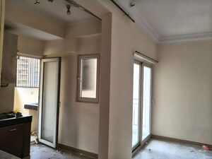 Building Lobby in 2 BHK Apartment at Paramount Floraville, Sector 137 – for Rent